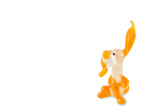 Toy glass puppy on a white background. With clipping path.