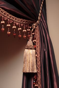 Beautiful curtain tied up by a cord