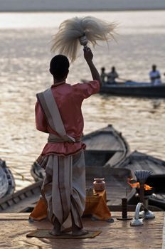 Hindu Priest conducts religious ceremony in Varanasi, Uttar Pradesh, India.