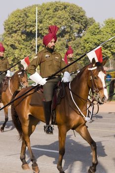 Lancer on horseback riding down the Raj Path in preparation for the Republic Day Parade, New Delhi, India