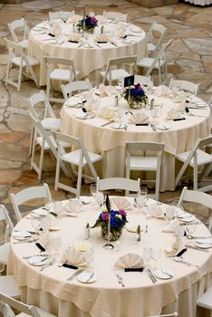 image of tables set for an event, party or wedding reception 