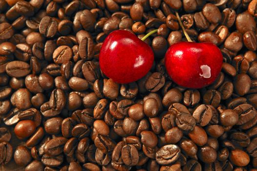 Toasted coffe beans texture and red cherry fruits