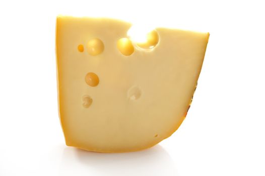 Maasdam swiss cheese slice isolated on white