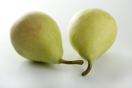 Pears over white background studio shoot