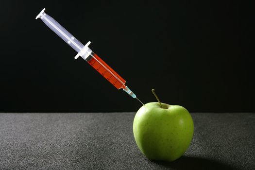Apple fruit research metaphor, red syringe manipulation