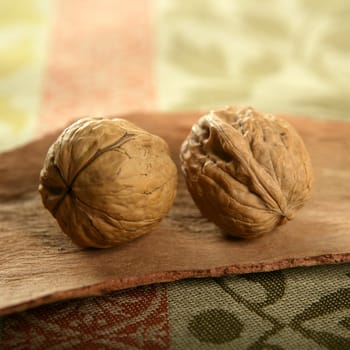 two walnut over tablecloth and wood