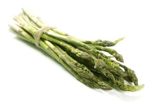 Asparagus green bunch isolated on white studio background