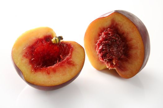 Metaphor of bloody inside of half peach