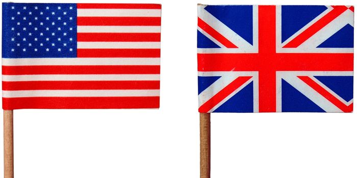 Flags of the UK (Union Jack) and USA isolated over white
