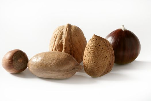 Nuts mix, walnuts, pecam hazelnut, almond, chestnut, isolated white studio background