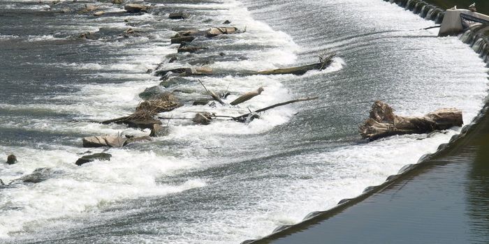 A dam for blocking or retaining a stream of water