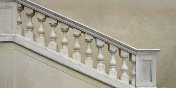 Stone baroque balaustrade as a staircase handrail