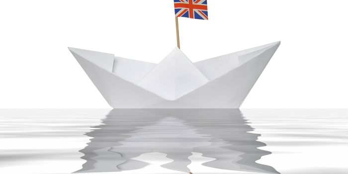 Toy paper boat with union jack UK flag