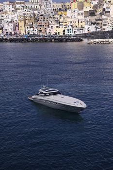 ITALY, Campania, Procica island, aerial view, a luxury yacht in the island's bay