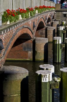 old stone bridge decorated with flowers in Hamburg