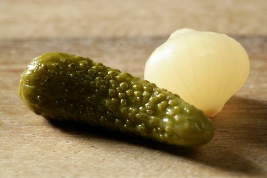 Green pickles macro detail studio shot, textured skin