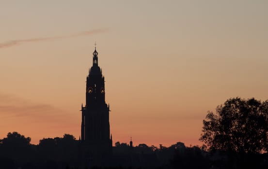 Sunrise behind a church