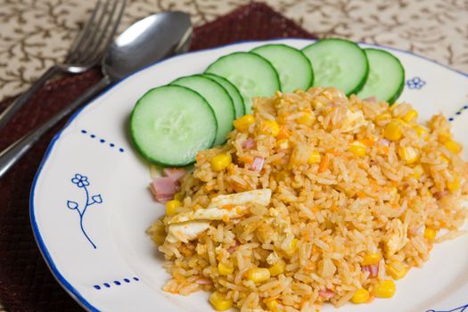 Close up of a plate of delicious spicy indonesian fried rice