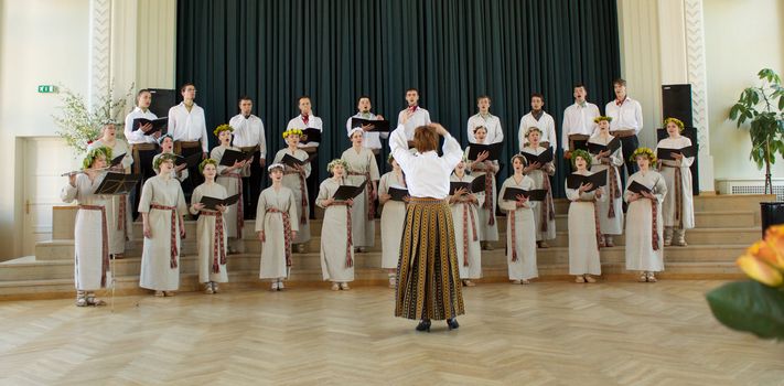 JELGAVA, LATVIA - MAY 08 : Choir performs onstage at Local Choir Competition 2011 May 08, 2011 in Jelgava, LATVIA