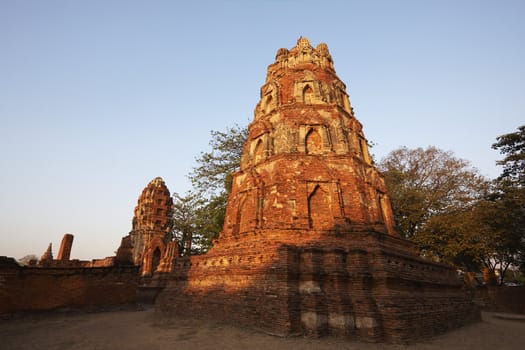 THAILAND, Ayutthaya, the ruins of the city's ancient temples at sunset