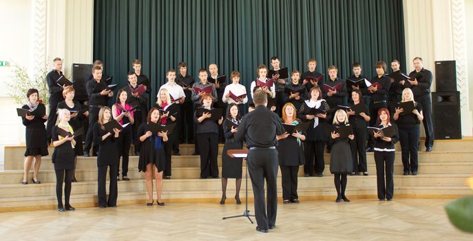 JELGAVA, LATVIA - MAY 08 : Choir SPĪGANA performs onstage at Local Choir Competition 2011 May 08, 2011 in Jelgava, LATVIA