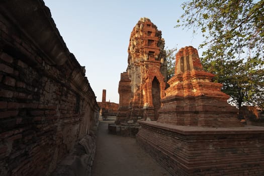 THAILAND, Ayutthaya, the ruins of the city's ancient temples at sunset