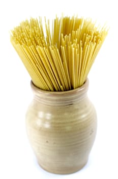  uncooked spaghetti in an earthenware pot.