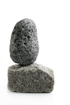 Volcanic Pumice, over granite brick stone on white background