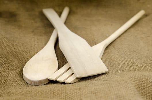 a set of wooden kitchen accessories