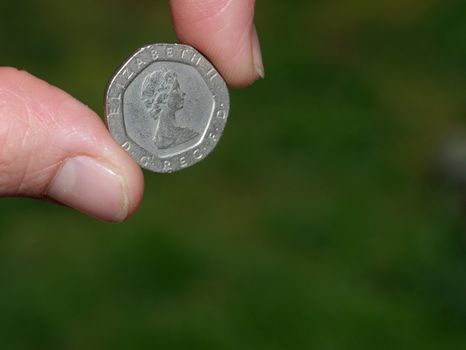 holding english coin