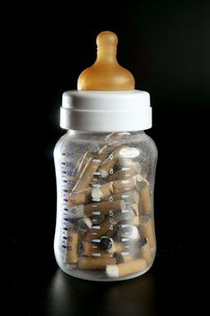 Tobacco addiction metaphor with baby bottle full of cigarettes