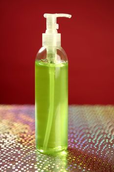 Aloe vera green gel transparent bottle, studio shot