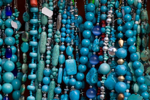 Handcrafted blue gemstone jewelry on open air market