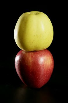 Apple fruit macro close up isolated over black studio background