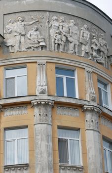 The socialist bas-relief on the wall of a building in Saratov