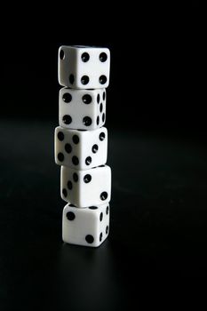 Gambler five dices, luck metaphor over black background