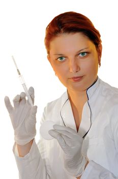 doctor (woman) with gloves and syringe on a white background