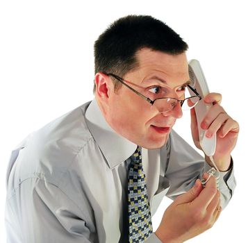 portrait of man in glasses with a telephone