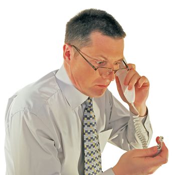 portrait of man in glasses with a telephone
