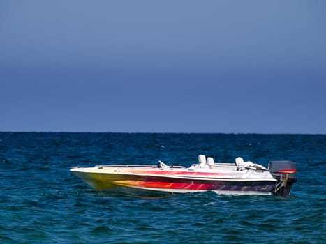 Colorful and empty speedboat in the Mediterranean waters