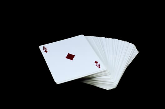 a package of cards game with the ace of tile at first