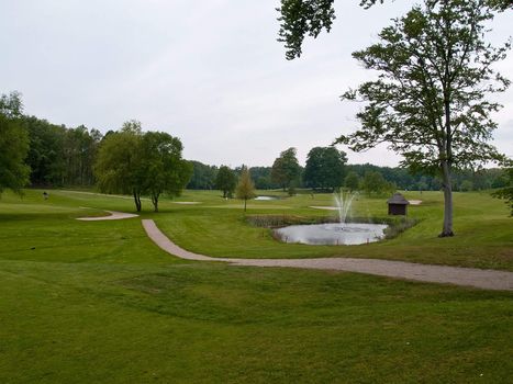 Wide view of a beautiful golf park course      