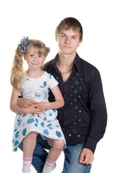 Older brother and younger sister in studio