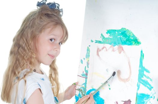 Shot of little girl painting in studio