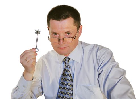 portrait of man in glasses with a toy key