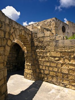 Highly eroded limestone medieval ruins from Aragonese period in the citadel in Gozo Malta