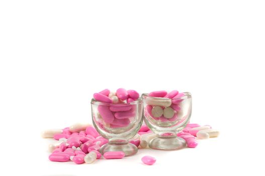 Shot of different pills isolated on white