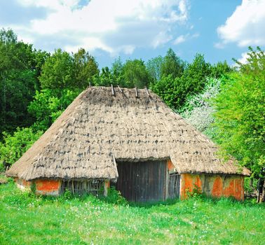 cabin of poor peasant in a national park Pirogovo (Ukraine)