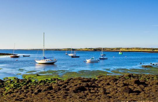 Boats on Galway Bay in Ireland on a sunny day