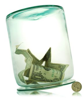 money box in form transparent glass jar